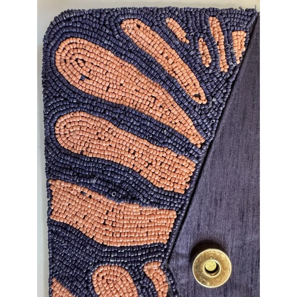 On 34th hand-beaded envelope clutch -navy and coral pink zebra stripe design